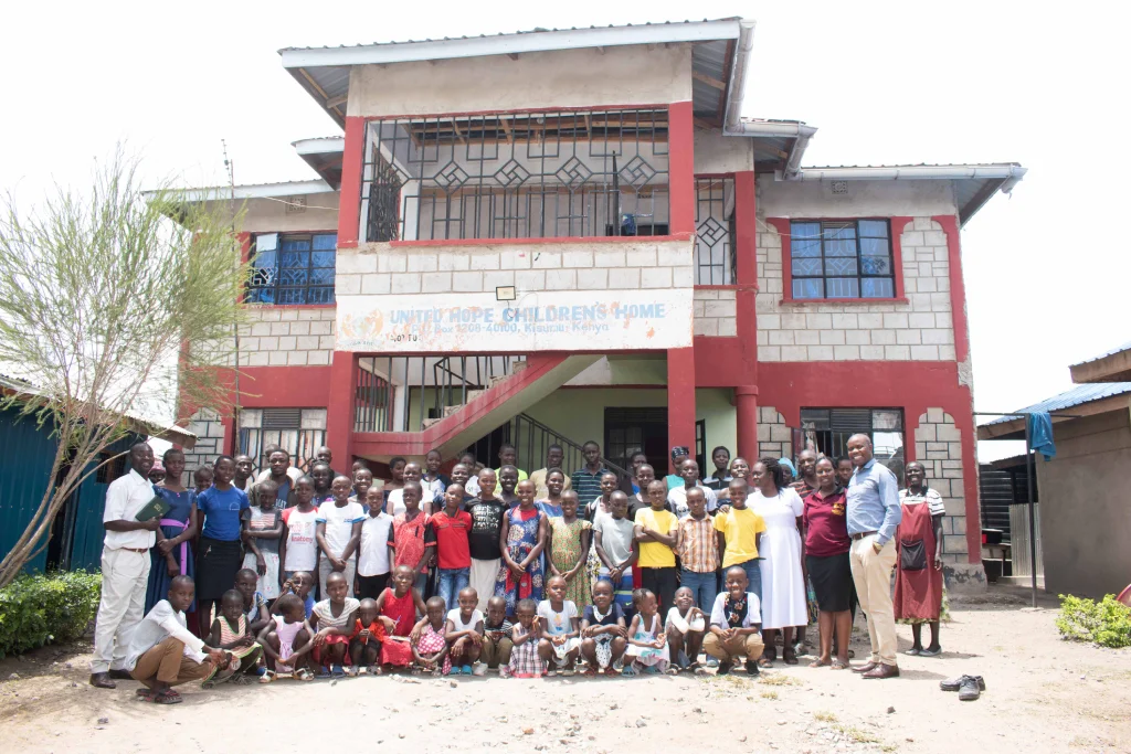 united hope family children in school uniform